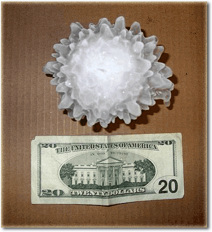 Large hail stone that can really put a dent in your car.